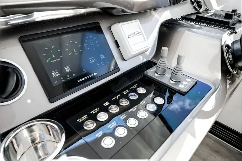 Slide: The Image of Control panel of 2024 Galeon 500 Fly yacht with digital display and joystick controls. - 35