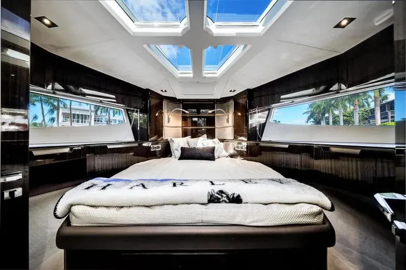 Slide: The Image of Luxurious interior of 2024 Galeon 500 Fly yacht with skylights and elegant bedding. - 48