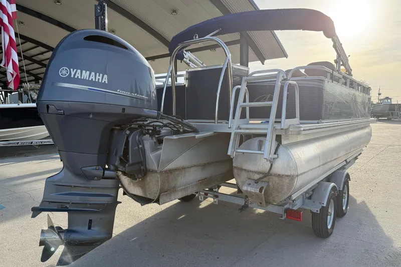 Slide: The Image of 2019 Avalon Venture Fish N Cruise 20' pontoon boat with Yamaha outboard motor. - 3