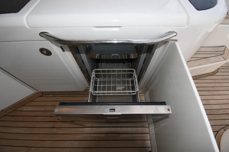 Slide: The Image of Open drawer on 2013 Sea Ray Sundancer 540 yacht, showcasing interior storage space. - 18