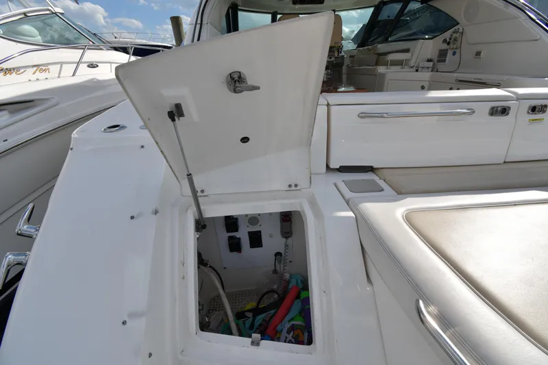 Slide: The Image of Open storage compartment on a 2013 Sea Ray Sundancer 540 yacht deck. - 24