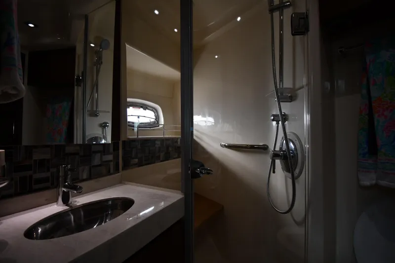 Slide: The Image of Luxurious bathroom in 2013 Sea Ray Sundancer 540 yacht with modern fixtures. - 33