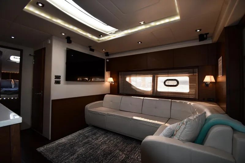 Slide: The Image of Luxurious interior of 2013 Sea Ray Sundancer 540 yacht with modern furnishings and ambient lighting. - 35