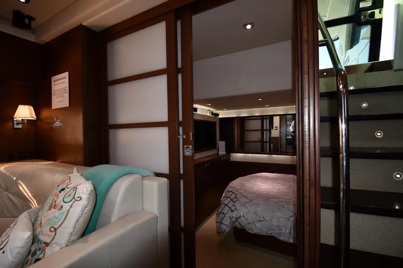 Slide: The Image of Luxurious interior of 2013 Sea Ray Sundancer 540 yacht with cozy seating and elegant bedroom. - 44