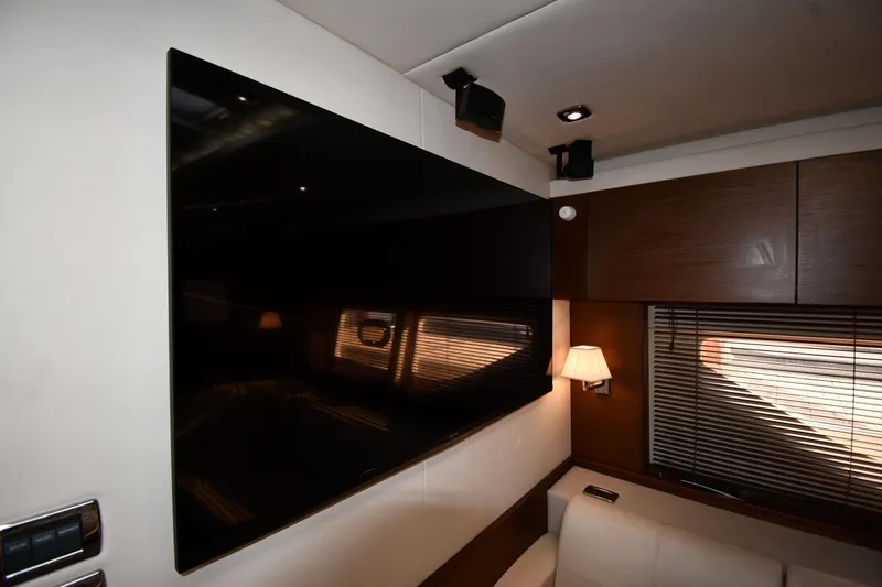 Slide: The Image of Luxurious interior of 2013 Sea Ray Sundancer 540 yacht with modern TV and elegant lighting. - 54