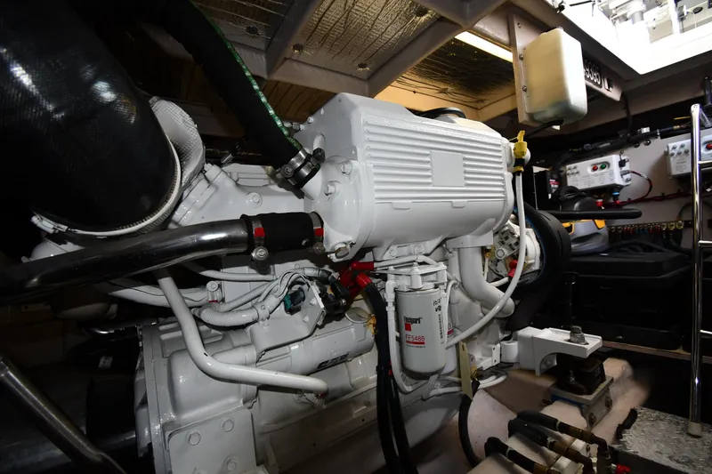 Slide: The Image of Engine room of 2013 Sea Ray Sundancer 540 yacht, showcasing detailed machinery and components. - 57