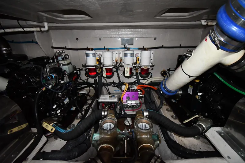 Slide: The Image of Engine room of 2013 Sea Ray Sundancer 540 with visible machinery and components. - 60