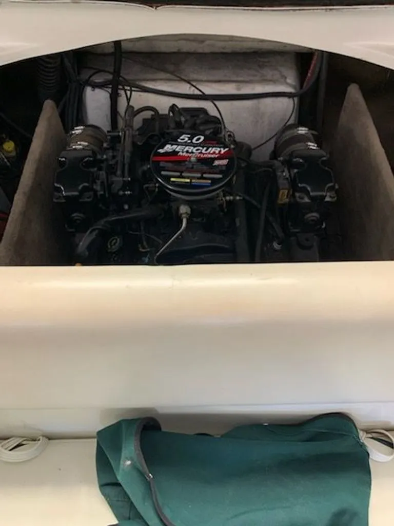 Slide: The Image of 2001 Caravelle Open Bow boat engine, Mercury 5.0 liter. - 6