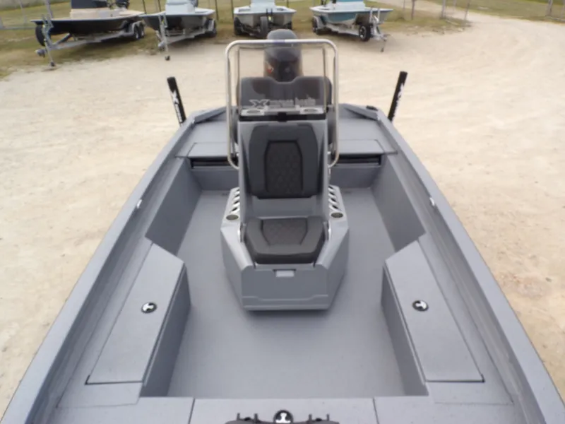 Slide: The Image of Xpress SW20B 2026 boat with gray interior and steering console. - 18
