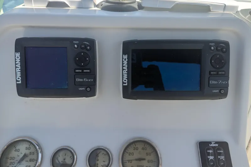 Slide: The Image of Dashboard of a 2005 Sailfish 218 WAC with Lowrance Elite fish finders. - 10