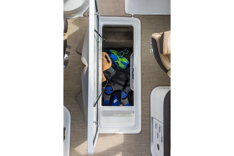 Slide: The Image of Manufacturer Provided Image: 2019 Sea Ray SLX 250 storage compartment with snorkeling gear. - 13