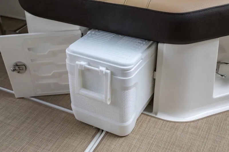 Slide: The Image of Manufacturer Provided Image: 2019 Sea Ray SLX 250 boat with built-in cooler storage under seat. - 14