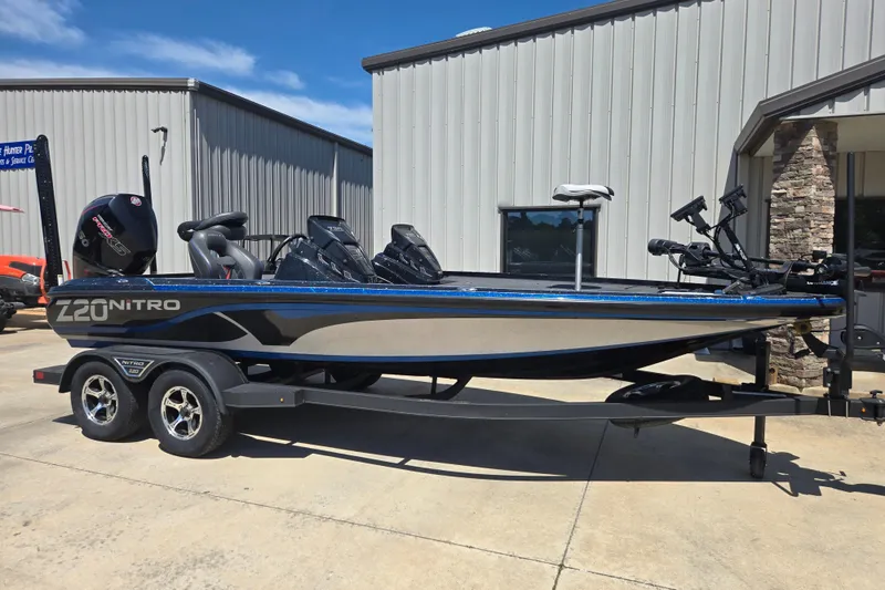 The Image of 2023 Nitro Z20 Pro fishing boat on trailer, parked outside a building. - 0