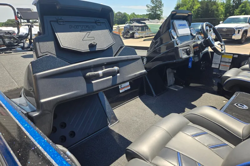 Slide: The Image of 2023 Nitro Z20 Pro boat interior with steering console and seating. - 14