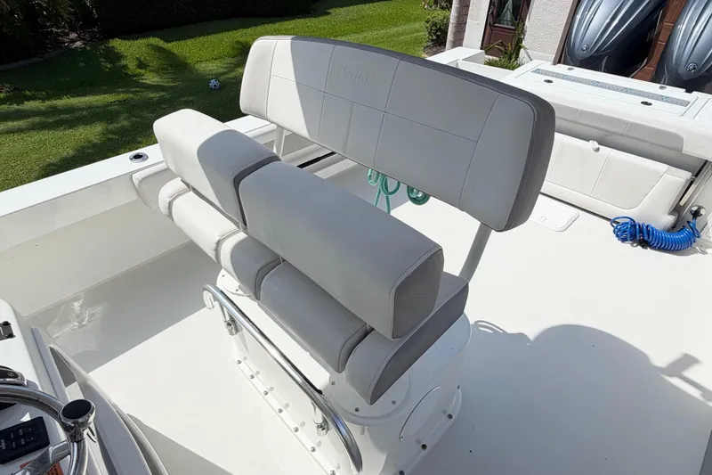 Slide: The Image of 2022 Parker 2801 Center Console boat with cushioned seating and modern design. - 12