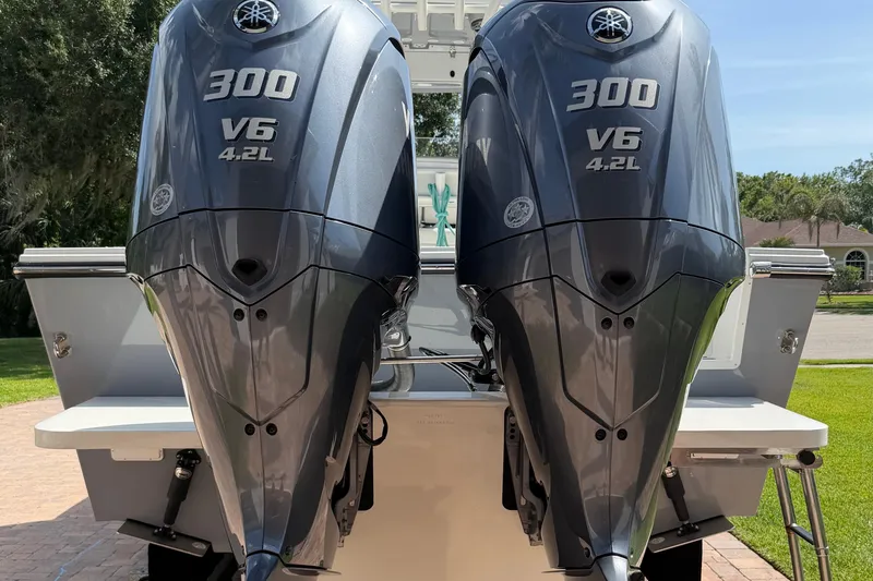 Slide: The Image of 2022 Parker 2801 Center Console with dual Yamaha 300 V6 4.2L outboard engines. - 3