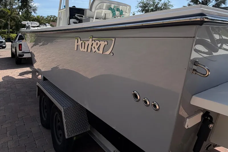 Slide: The Image of 2022 Parker 2801 Center Console boat on trailer, parked outdoors. - 7