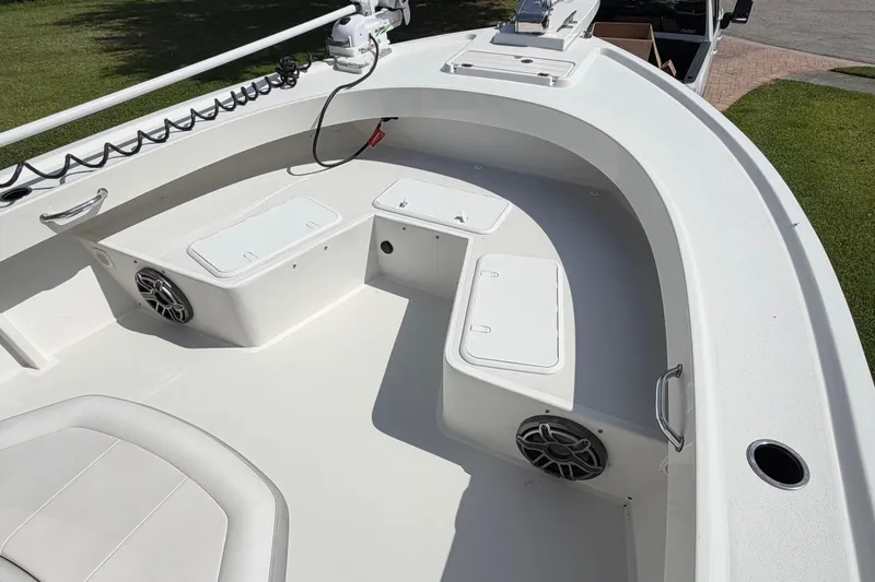 Slide: The Image of 2022 Parker 2801 Center Console boat interior with seating and storage compartments. - 9