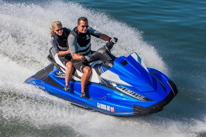 Slide: The Image of Manufacturer Provided Image: 2017 Yamaha WaveRunner VX Limited jet ski speeding on water with two riders. - 12