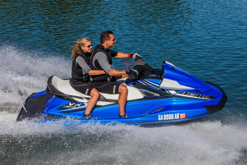 Slide: The Image of Manufacturer Provided Image: 2017 Yamaha WaveRunner VX Limited jet ski with two riders speeding on water. - 13