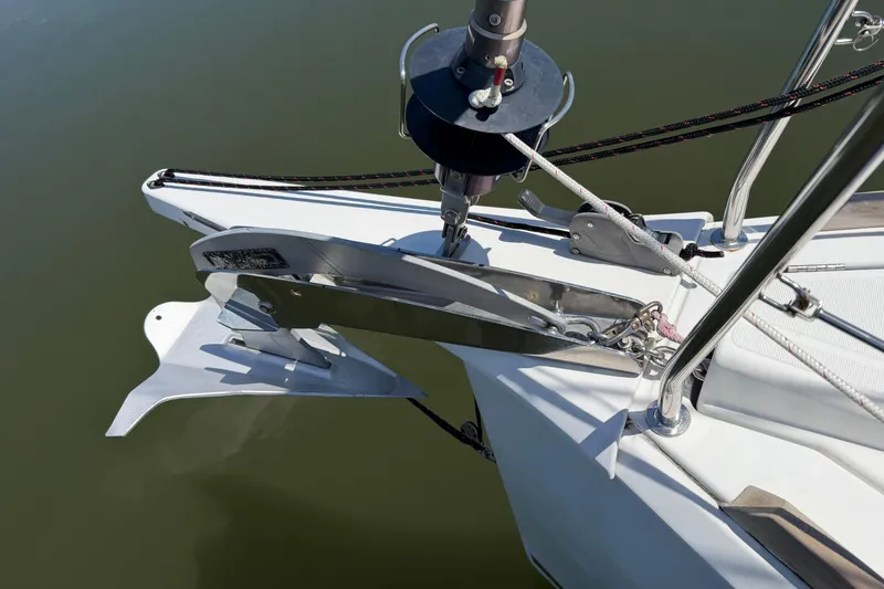 Slide: The Image of Bow of 2015 Jeanneau Sun Odyssey 349 with anchor and rigging details. - 11