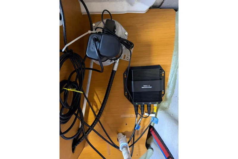 Slide: The Image of Electrical components and wiring inside a 2015 Jeanneau Sun Odyssey 349 sailboat. - 36