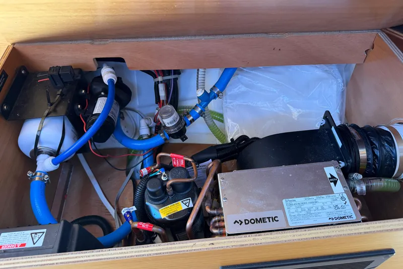 Slide: The Image of Engine compartment of a 2015 Jeanneau Sun Odyssey 349 sailboat with Dometic equipment. - 44