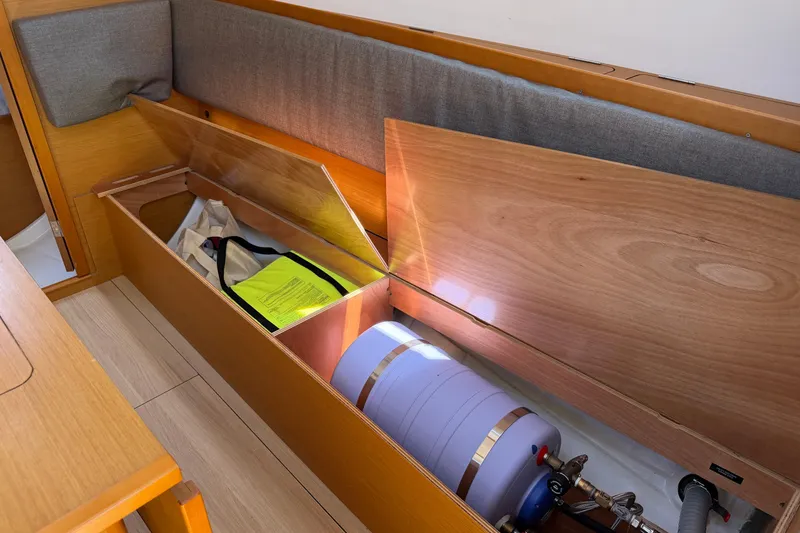 Slide: The Image of Storage compartment in a 2015 Jeanneau Sun Odyssey 349 sailboat interior. - 45