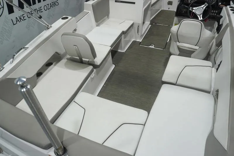 Slide: The Image of 2022 Glastron GTD 220 boat interior with white seating and modern design. - 5