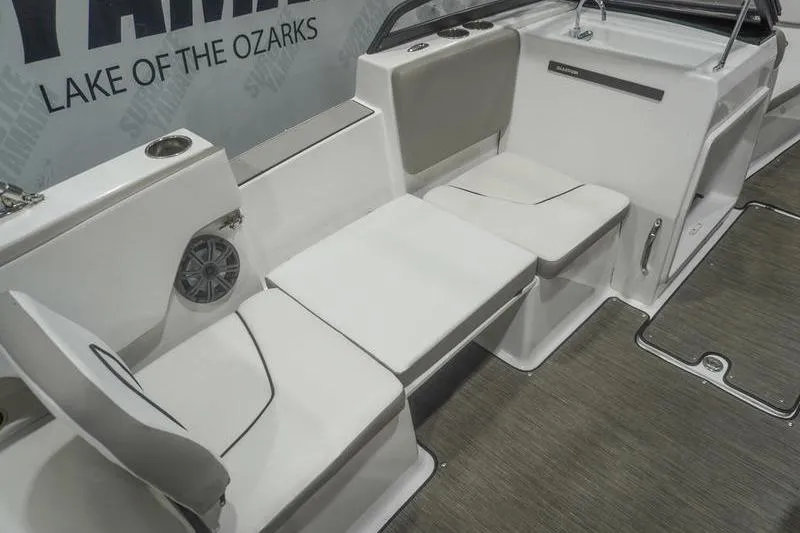 Slide: The Image of 2022 Glastron GTD 220 boat interior with white seating and cup holders. - 7