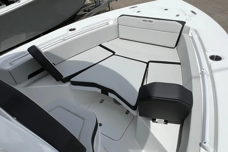 Slide: The Image of 2026 Sea Pro 245FLX Sandbar boat interior with sleek seating and modern design. - 15