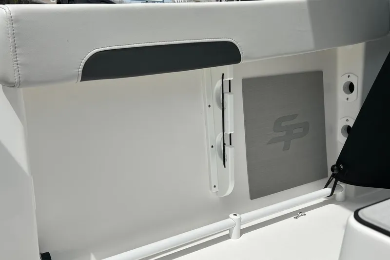 Slide: The Image of 2026 Sea Pro 245FLX Sandbar boat interior detail with logo and seating. - 19