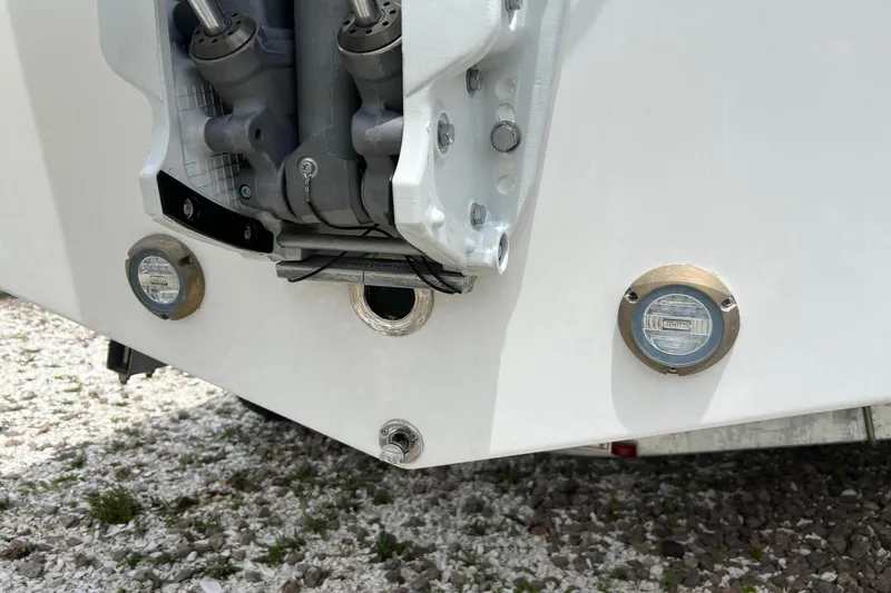 Slide: The Image of Rear view of 2026 Sea Pro 245FLX Sandbar boat with visible engine components. - 28