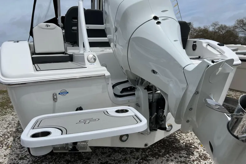 Slide: The Image of 2026 Sea Pro 245FLX Sandbar boat with powerful outboard motor and swim platform. - 30