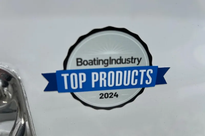 Slide: The Image of Boating Industry Top Products 2024 award badge on Sea Pro 245FLX Sandbar 2026 model. - 31