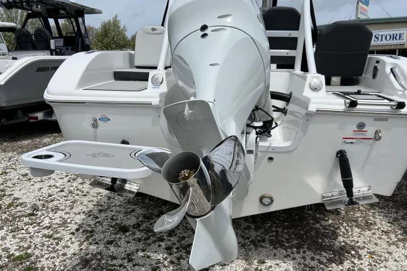 Slide: The Image of 2026 Sea Pro 245FLX Sandbar boat rear view with outboard motor and swim platform. - 4