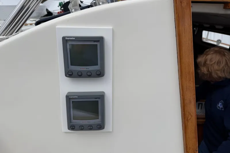 Slide: The Image of Raymarine speed and depth displays on 1982 Sabre 34 sailboat cockpit panel. - 28