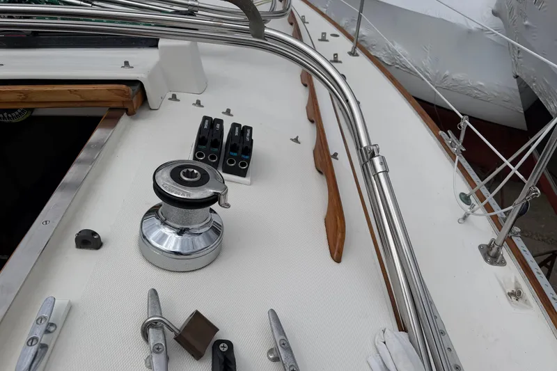 Slide: The Image of Deck of 1982 Sabre 34 sailboat with winch and cleats. - 43