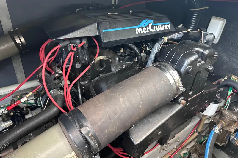 Slide: The Image of Engine compartment of a 1989 Sea Ray 390 Express Cruiser with MerCruiser components. - 46