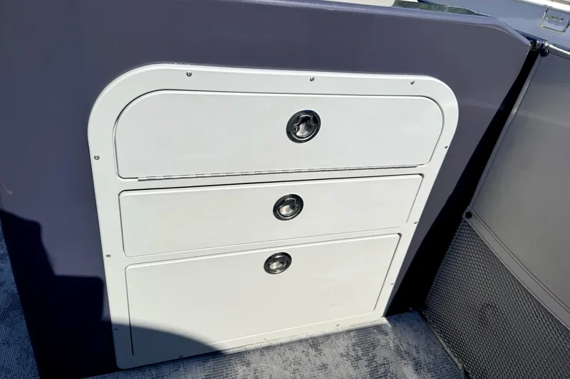 Slide: The Image of Storage compartment on 2022 Crest Continental 270 NX-CS Twin boat. - 13