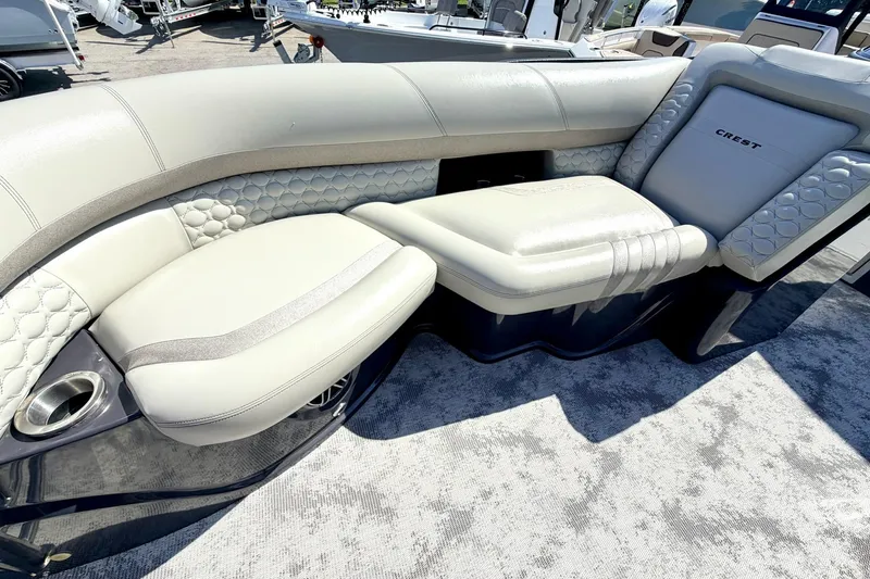 Slide: The Image of Luxurious seating on 2022 Crest Continental 270 NX-CS Twin boat, featuring elegant upholstery. - 20