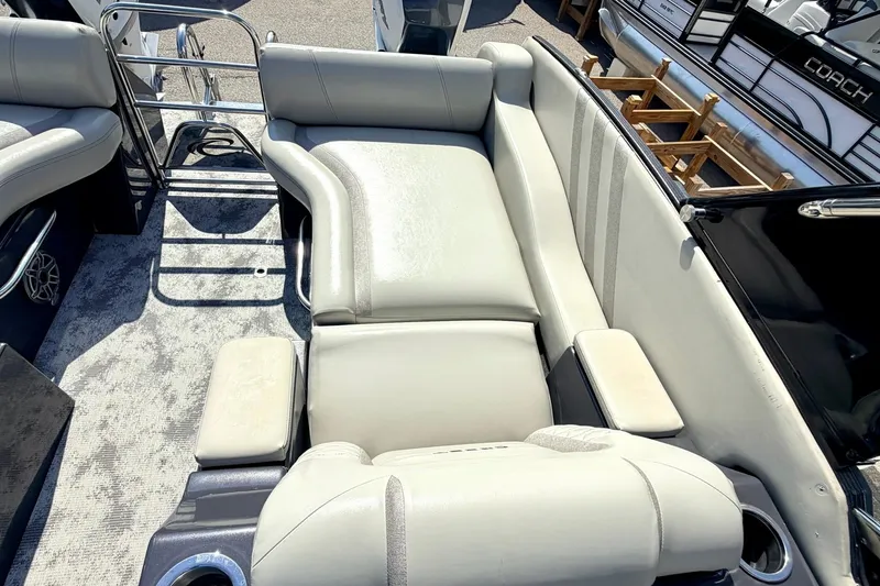 Slide: The Image of Luxurious seating on 2022 Crest Continental 270 NX-CS Twin pontoon boat, featuring plush upholstery. - 6
