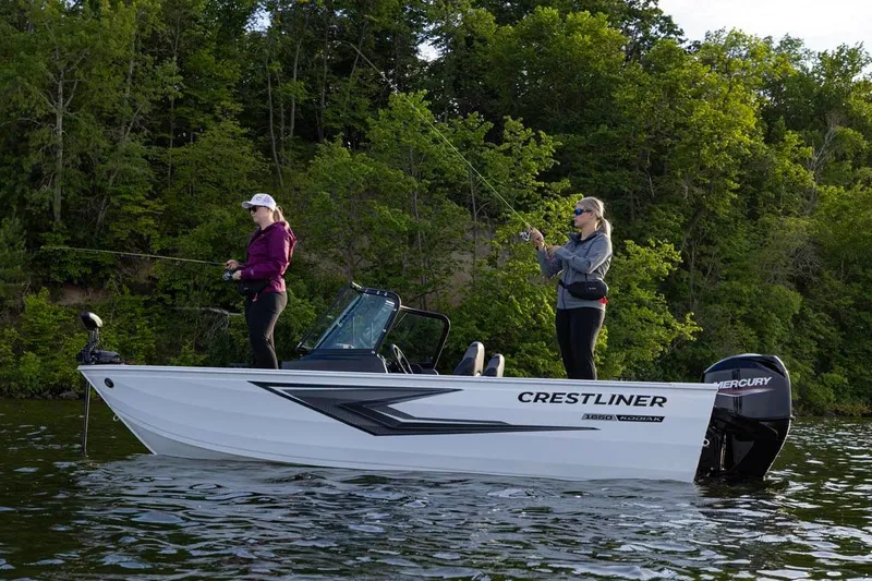 Slide: The Image of Manufacturer Provided Image: Two people fishing on a 2026 Crestliner 1650 Kodiak WT boat in a scenic lake. - 15
