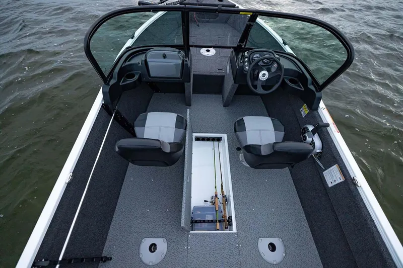 Slide: The Image of Manufacturer Provided Image: 2026 Crestliner 1650 Kodiak WT boat interior with seating and fishing rod storage. - 17
