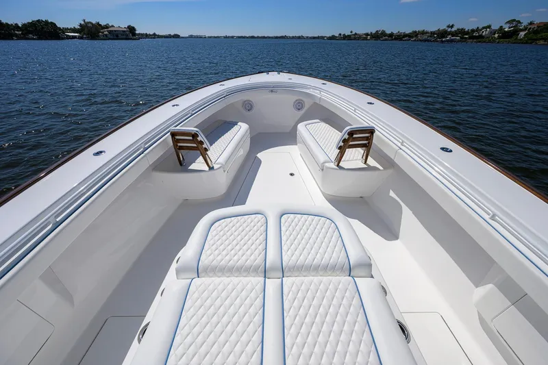 Slide: The Image of Valhalla Boatworks V-41 2025 model, featuring luxurious seating on open water. - 11