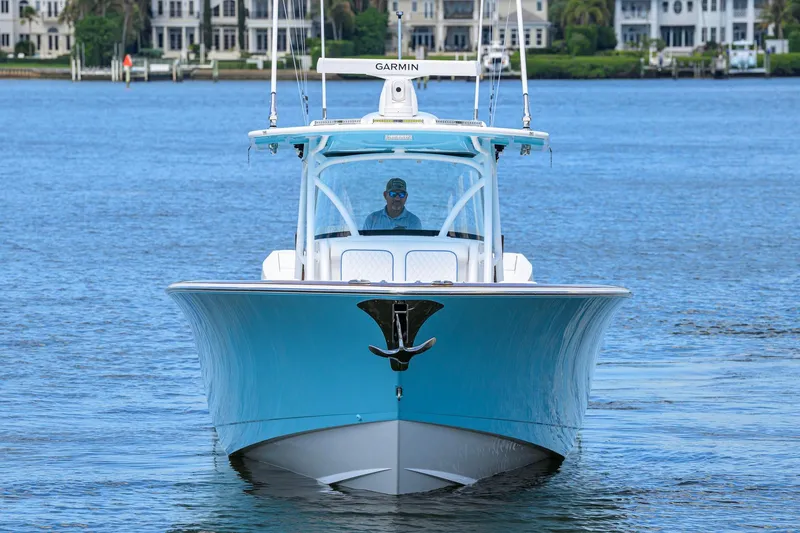 Slide: The Image of 2025 Valhalla Boatworks V-41 cruising on a serene waterway. - 2