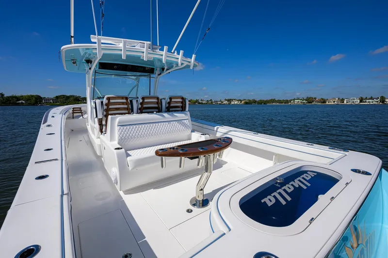 Slide: The Image of 2025 Valhalla Boatworks V-41 on water, showcasing sleek design and spacious seating. - 27