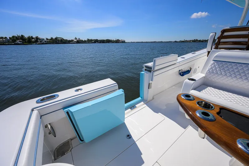 Slide: The Image of 2025 Valhalla Boatworks V-41 interior with luxurious seating and scenic water view. - 30