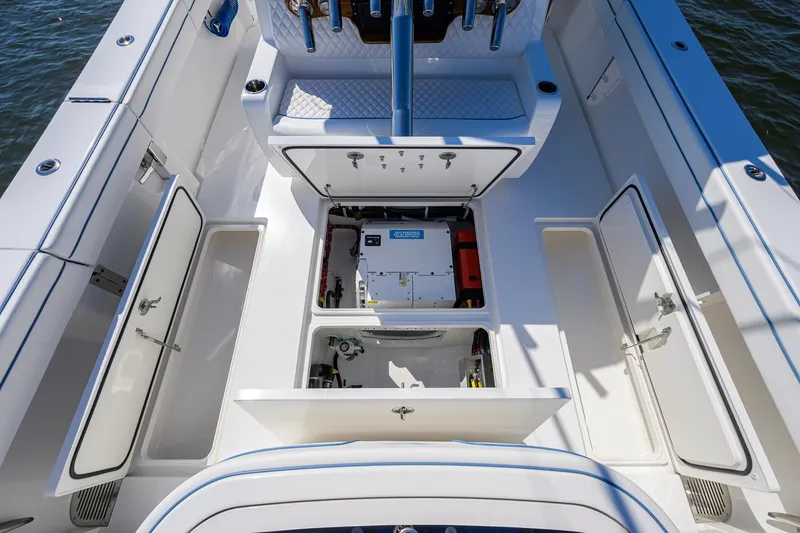 Slide: The Image of 2025 Valhalla Boatworks V-41 deck with open storage compartments and equipment. - 33