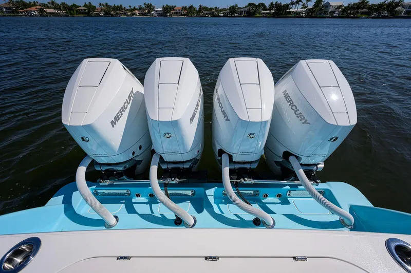Slide: The Image of 2025 Valhalla Boatworks V-41 with four Mercury outboard engines on water. - 37